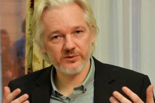 Assange Sarankan Wartawan Gunakan Pos untuk Hindari Spionase