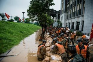 Hujan Lebat di Tiongkok Hampir Ratusan Orang Hilang 