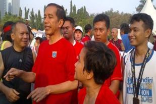 JakMar 2013: Jokowi Ikut Berlari Demi Mengalungkan Medali ke Peserta