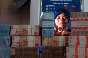 Defisit Transaksi Berjalan Triwulan III/2013 Turun 1,5 Miliar Dollar