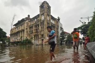 Jokowi Mengaku Masalah Banjir Belum Bisa Rampung Semua