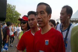 Jokowi Pastikan Harga Tiket TransJakarta Tidak Naik