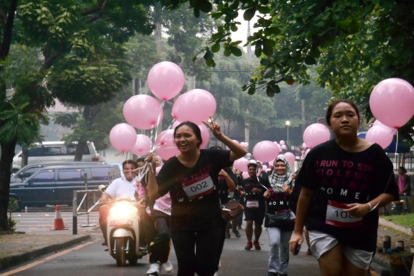 Kampanye Antikekerasan Perempuan dengan Lomba Lari