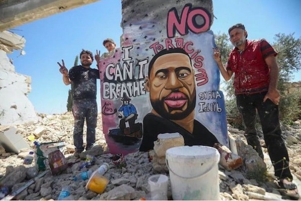 Seniman Suriah Lukis George Floyd di Reruntuhan Akibat Perang